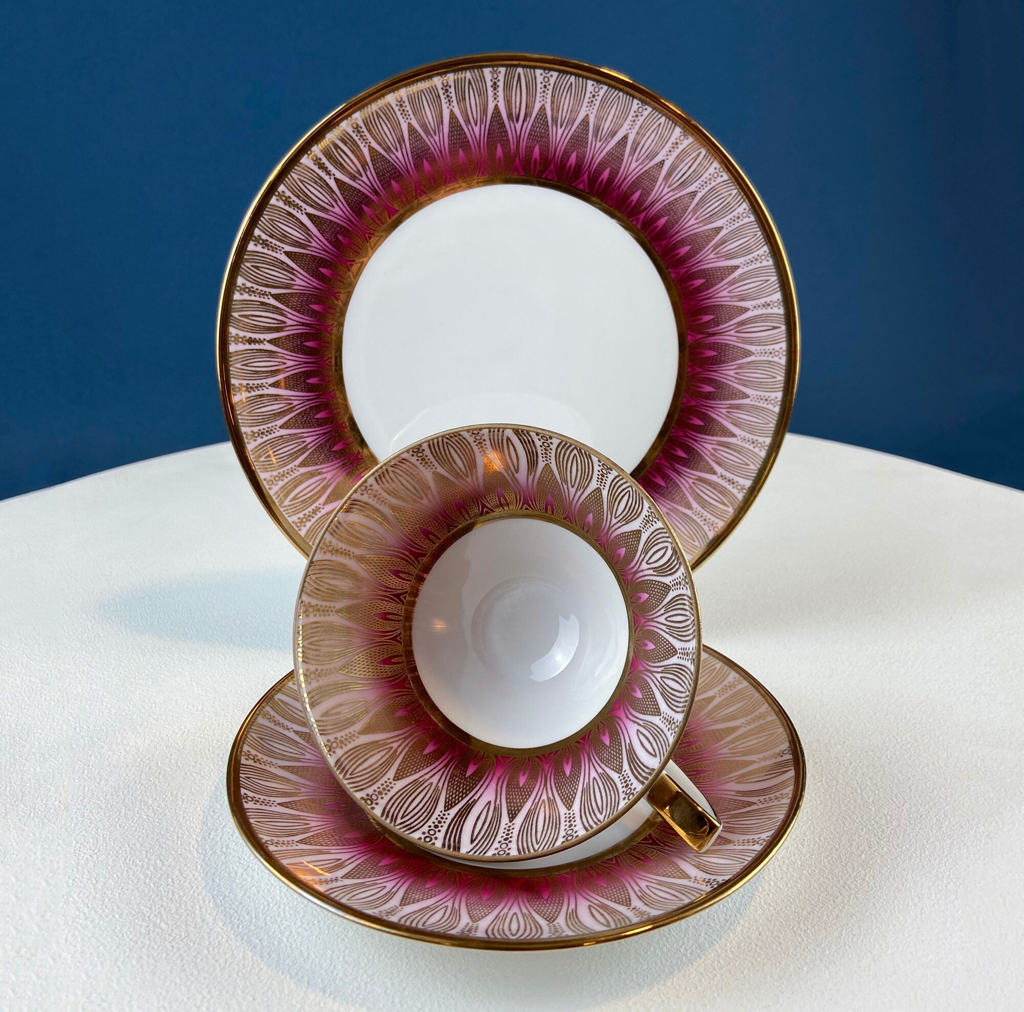 Antique Bavarian Porcelain Tea Trio. Winterling Roslaw. Cup, Saucer, and Dessert Plate in Gold and Pink. Modern Lotus Pattern.